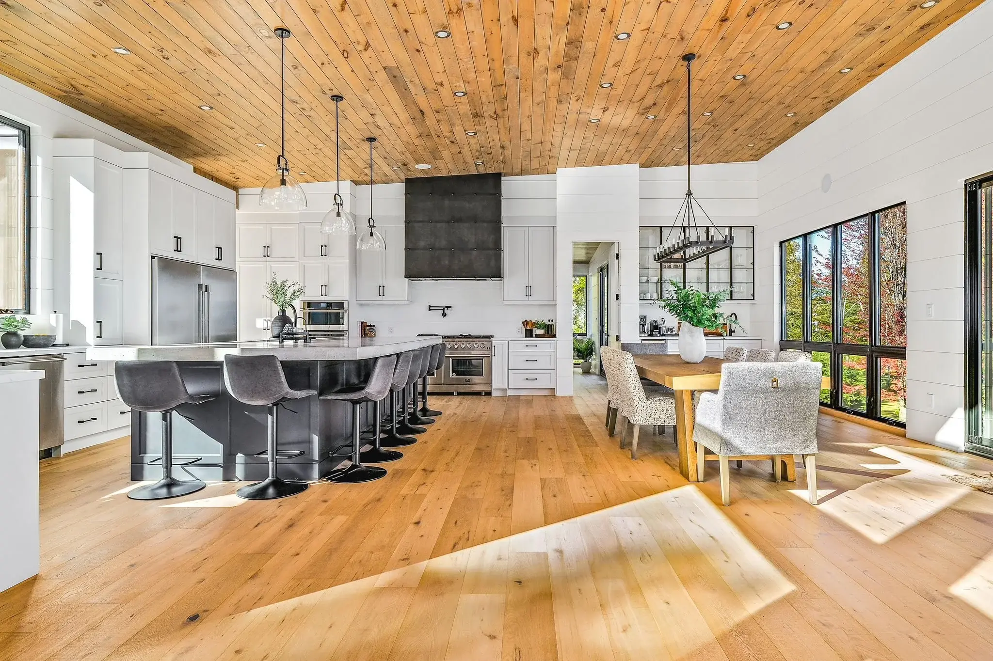 The View on Balsam: kitchen with oversized island and pendant lighting
