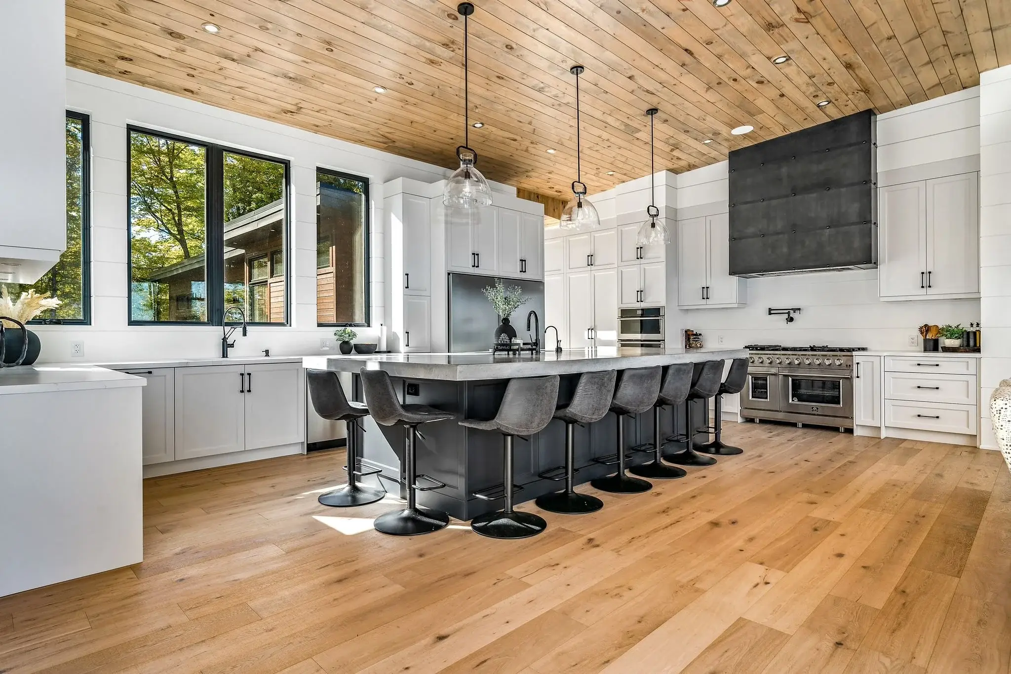 The View on Balsam: kitchen island seating facing the range wall